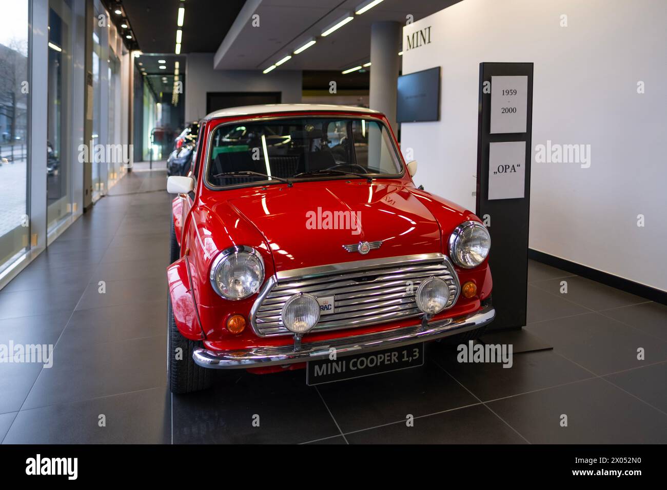 vintage Red Classic Rover Mini Cooper 1.3 Oldtimer in showroom, iconic ...