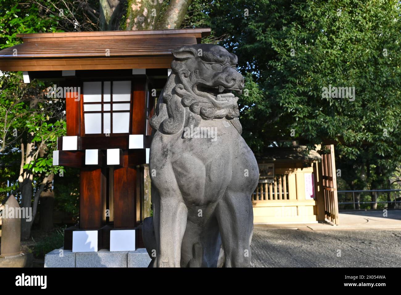 Komainu (lion-dogs) statue at Tōgō Shrine - Jingumae, Shibuya City, Tokyo, Japan – 01 March 2024 Stock Photo