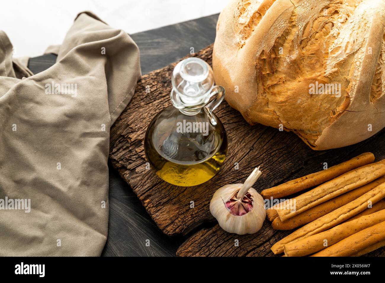 breadsticks and country bread, with olive oil, garlic and flavored mayonnaise Stock Photo