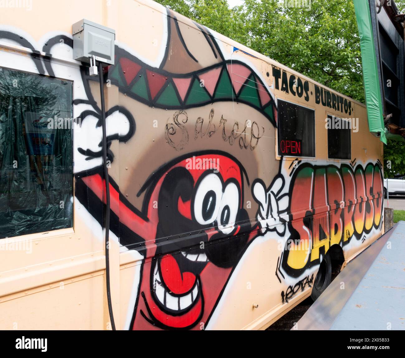 Taco truck to grab a meal with fun caricature painting on the truck. St Paul Minnesota MN USA Stock Photo