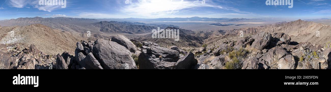 panorama from the summit of Adalac Benchmark Mountain in Southern Nevada looking over the Ivanpah Valley and Primm Stock Photo