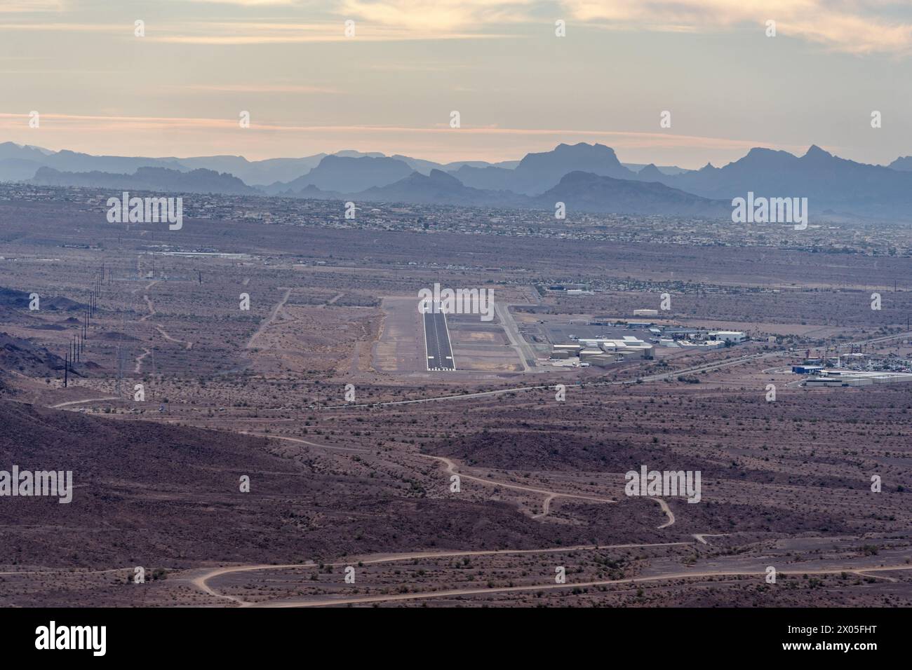 distant view from above to the northwest of the Lake Havasu City Municipal Airport or HII runway as one would see on approach Stock Photo