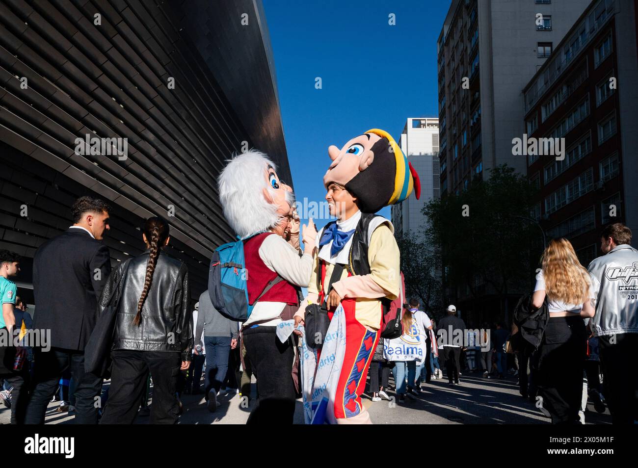 Madrid, Spain. 09th Apr, 2024. Mascots dressed as Pinocchio characters are seen outside the Santiago Bernabéu stadium as Real Madrid fans attend the Champions League football match against the British football team Manchester City. (Photo by Miguel Candela/SOPA Images/Sipa USA) Credit: Sipa USA/Alamy Live News Stock Photo