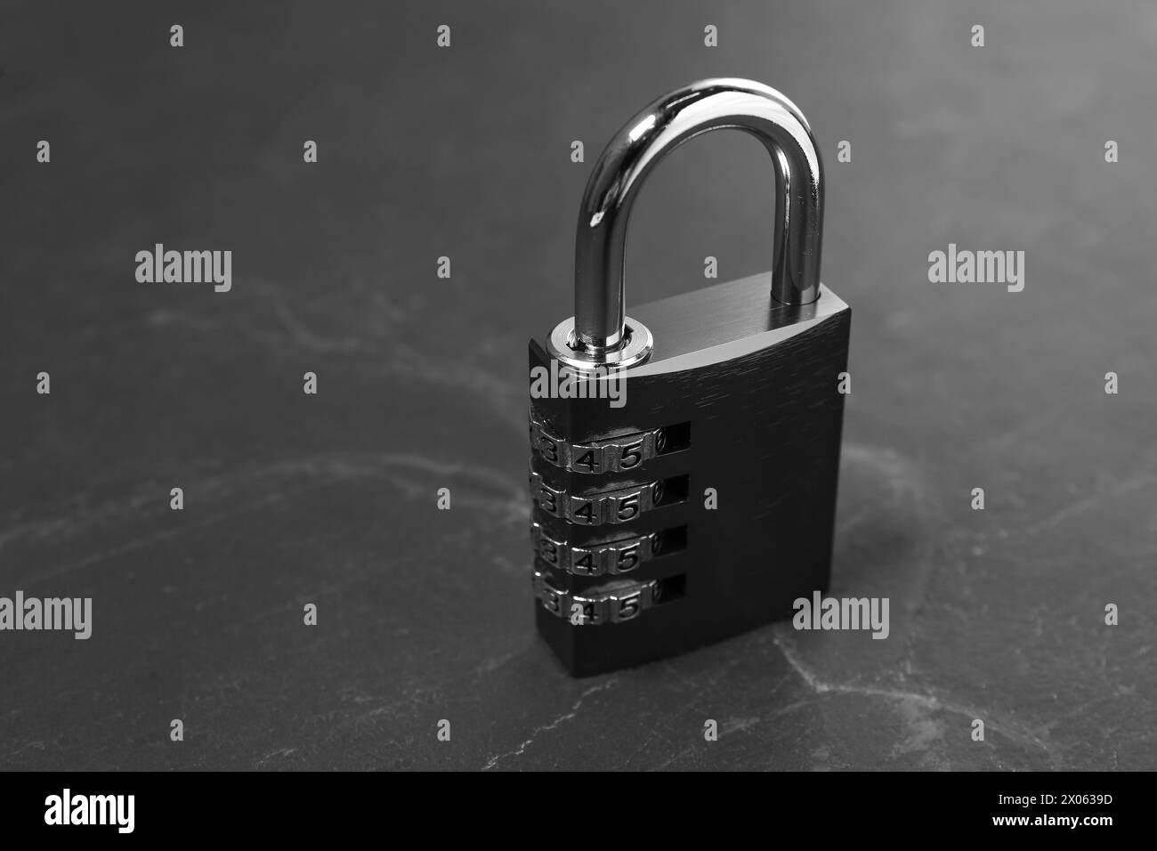 One steel combination padlock on black table, closeup Stock Photo - Alamy