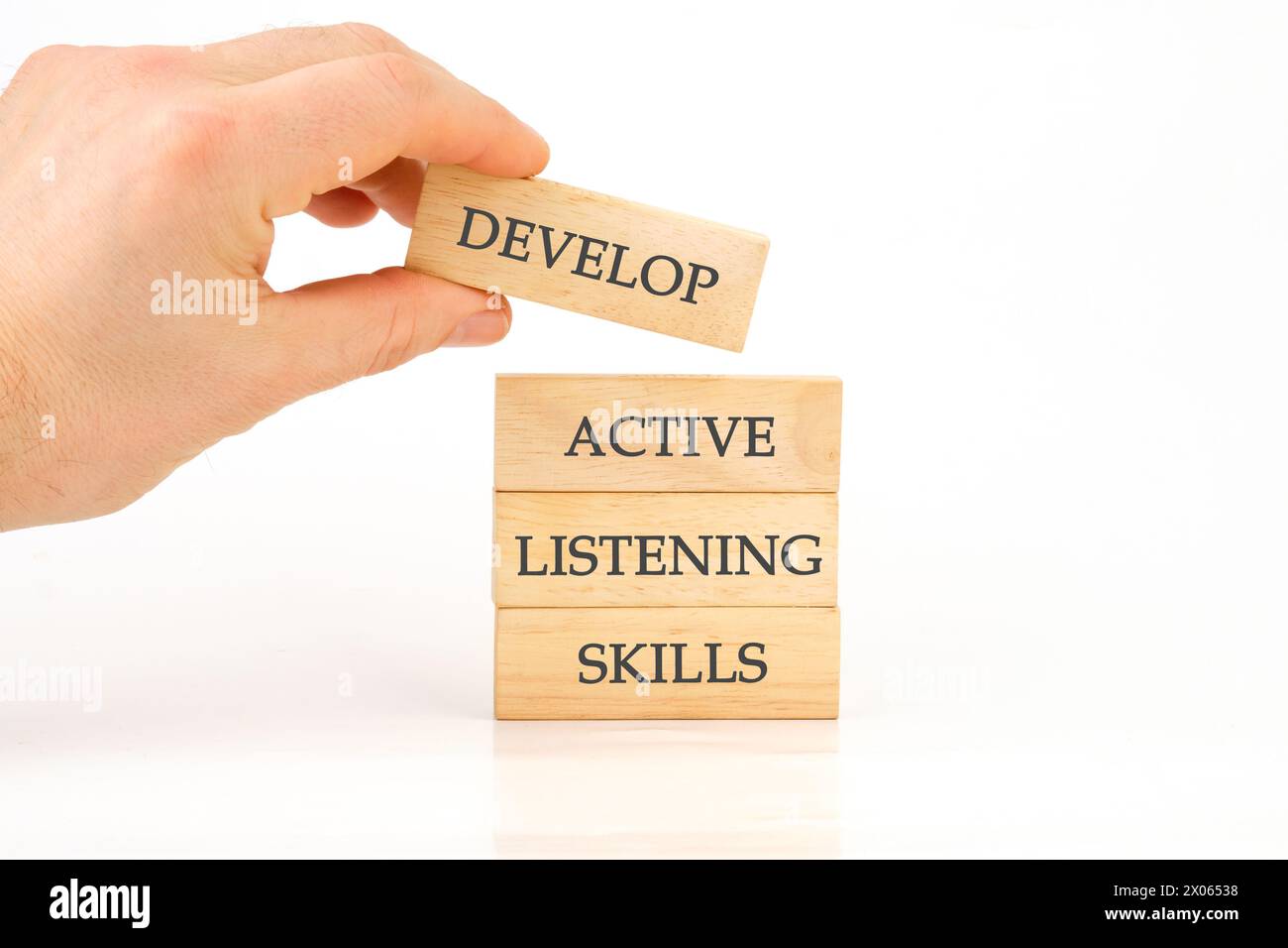 Concept word Develop active listening skills on wooden blocks assembled ...