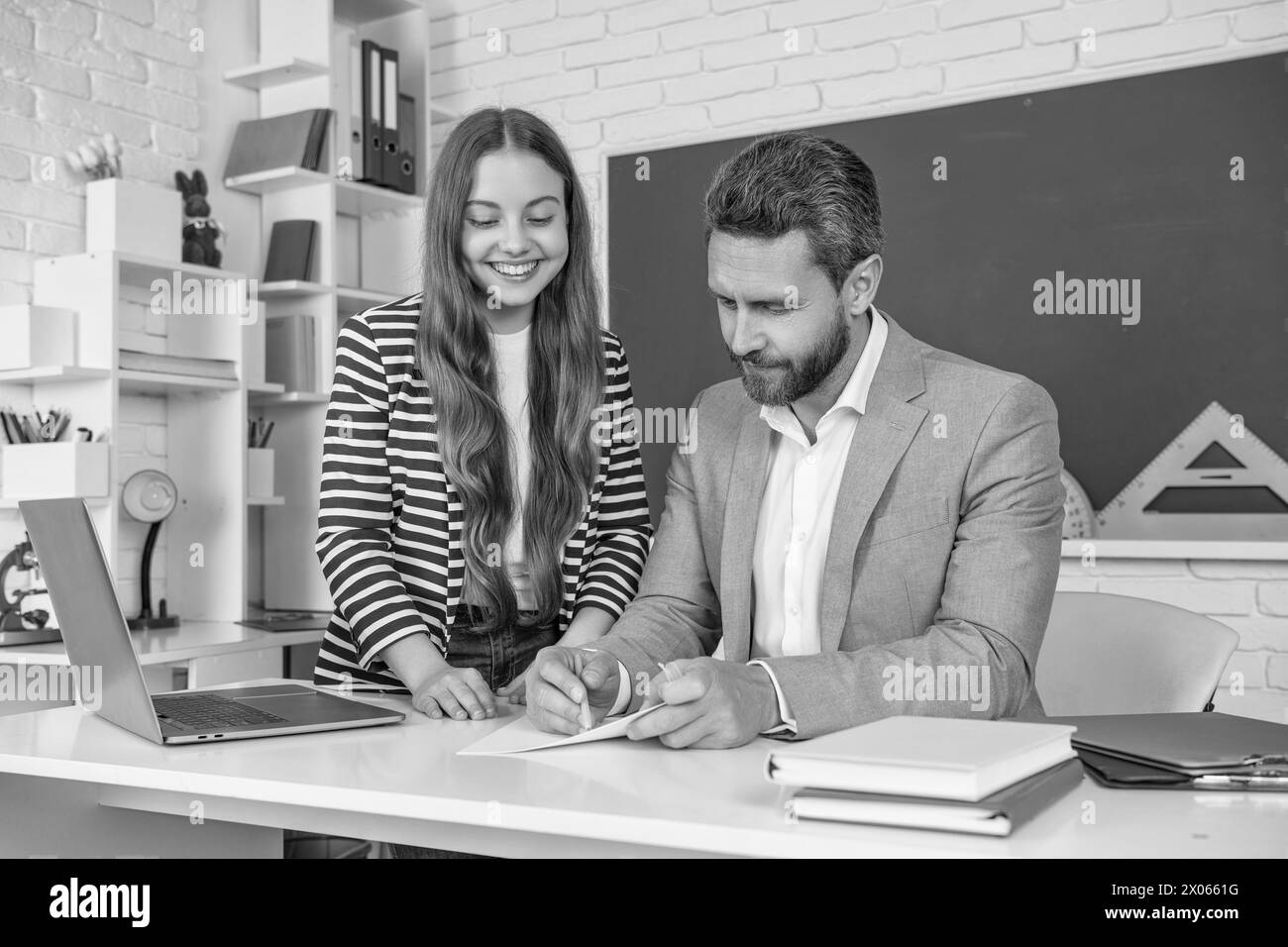 Happy child study in classroom with teacher stock photo alamy