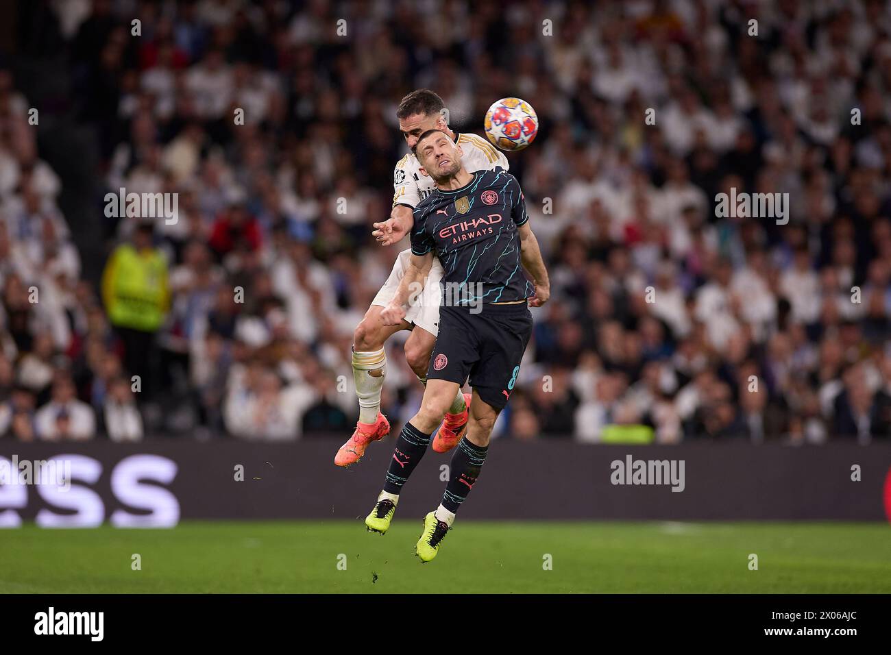 Madrid, Spain. 09th Apr, 2024. Mateo Kovacic (R) of Manchester City with Daniel Carvajal (L) of Real Madrid CF in action during the UEFA Champions League 2023/2024 quarter-finals first leg football match between Real Madrid CF and Manchester City at Santiago Bernabeu stadium. Final score: Real Madrid CF 3:3 Manchester City Credit: SOPA Images Limited/Alamy Live News Stock Photo