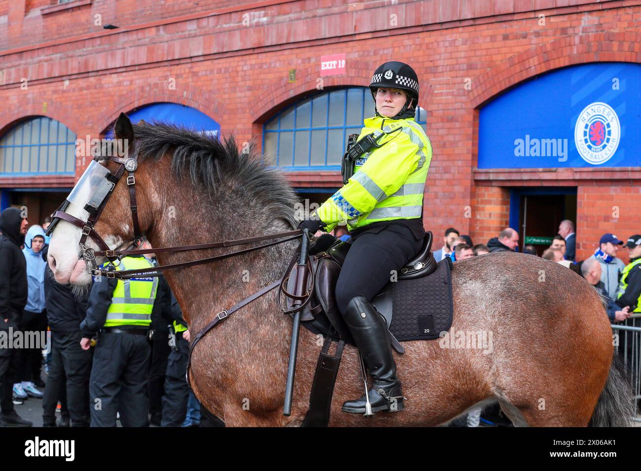 Mounted police officer, on duty at Ibrox Stadium prior to a Scottish Premiership football match, Glasgow, Scotland, UK Stock Photo