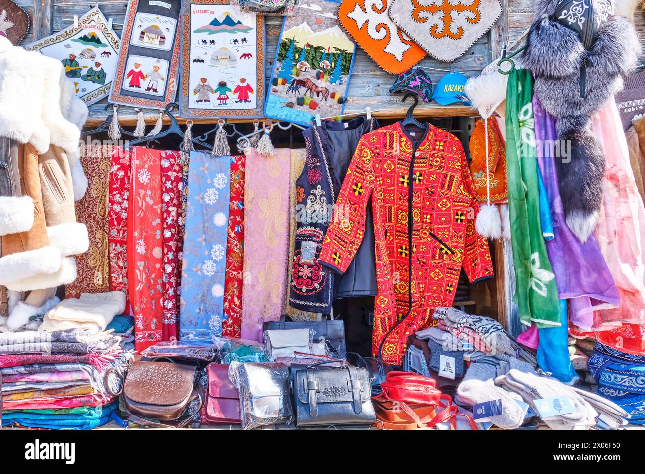 Souvenir shop at local market, Almaty, Kazakhstan. Silk stoles with