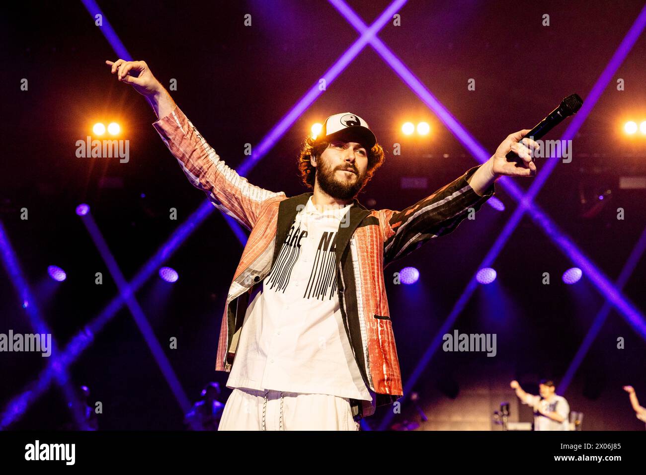 Pinguini Tattici Nucleari band performing live in 2025