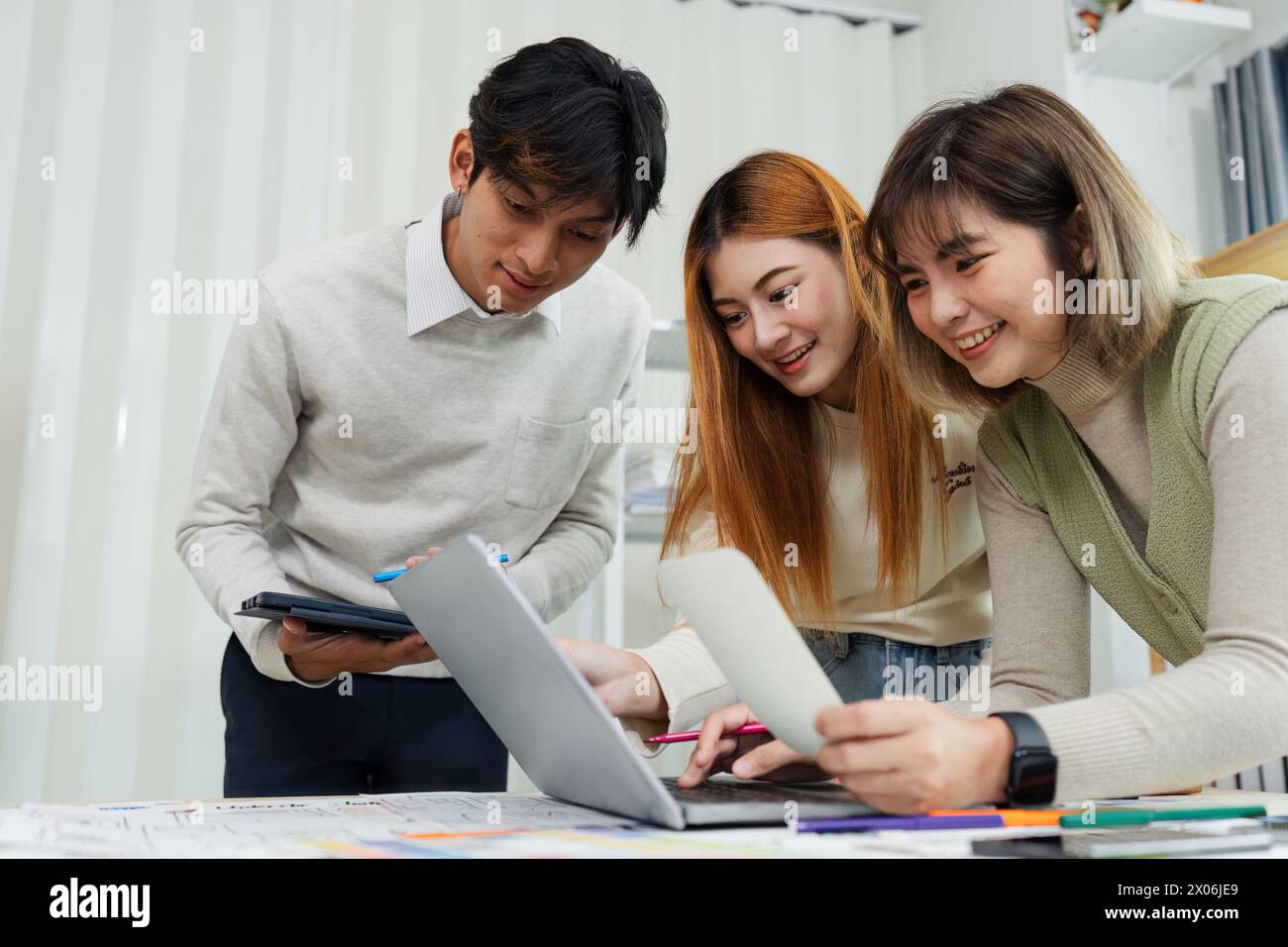 Close up ux developer and ui designer brainstorming interface wireframe design.Creative digital development agency Stock Photo