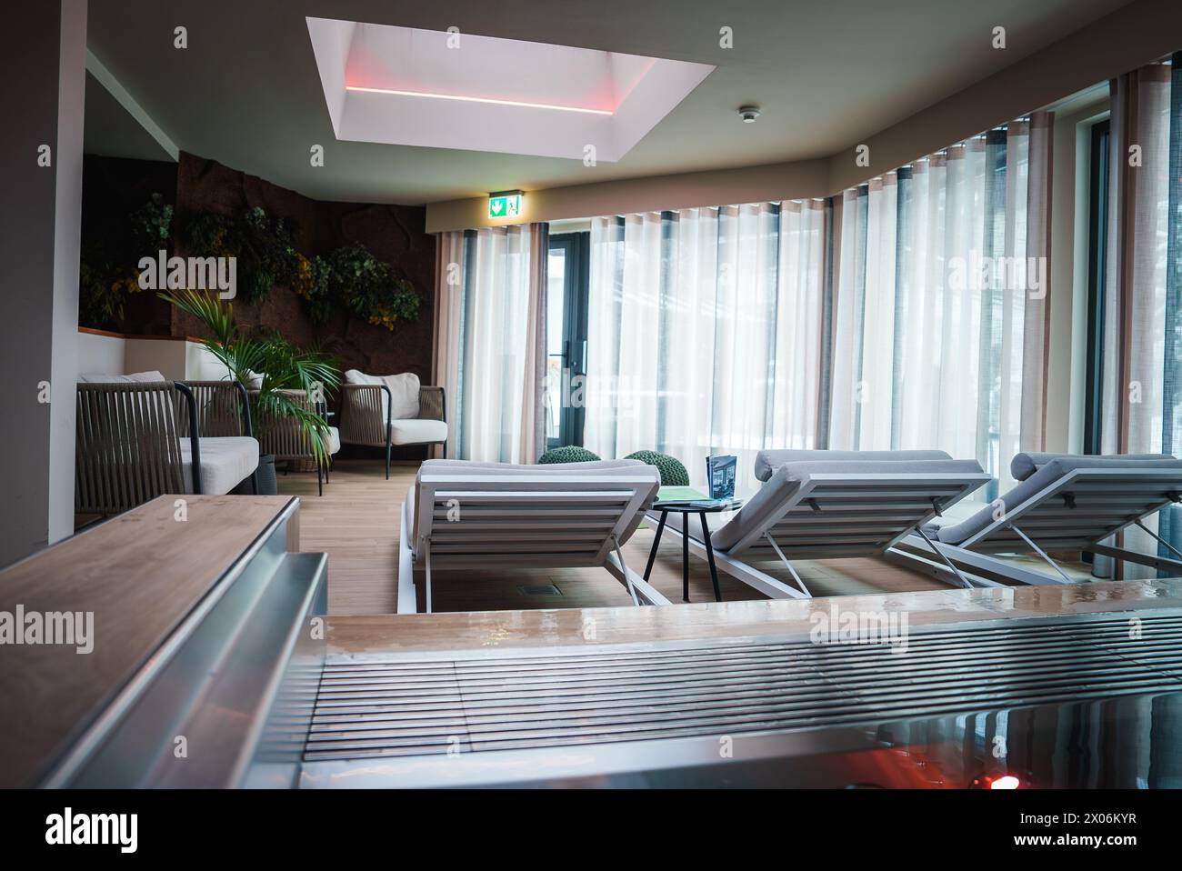 Image showcasing Luxury Relaxation Area with Hot Tub in Zermatt Hotel Stock Photo - Alamy