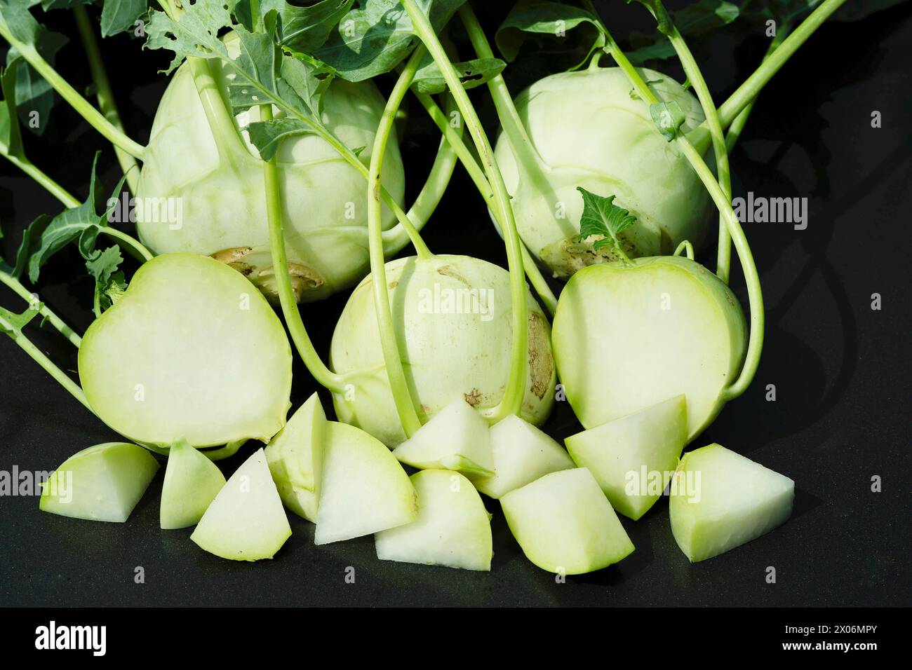 Kohl rabi, German turnip, turnip cabbage (Brassica oleracea convar. acepala var. gongylodes, Brassica oleracea var. gongylodes), white kohlrabis, slic Stock Photo