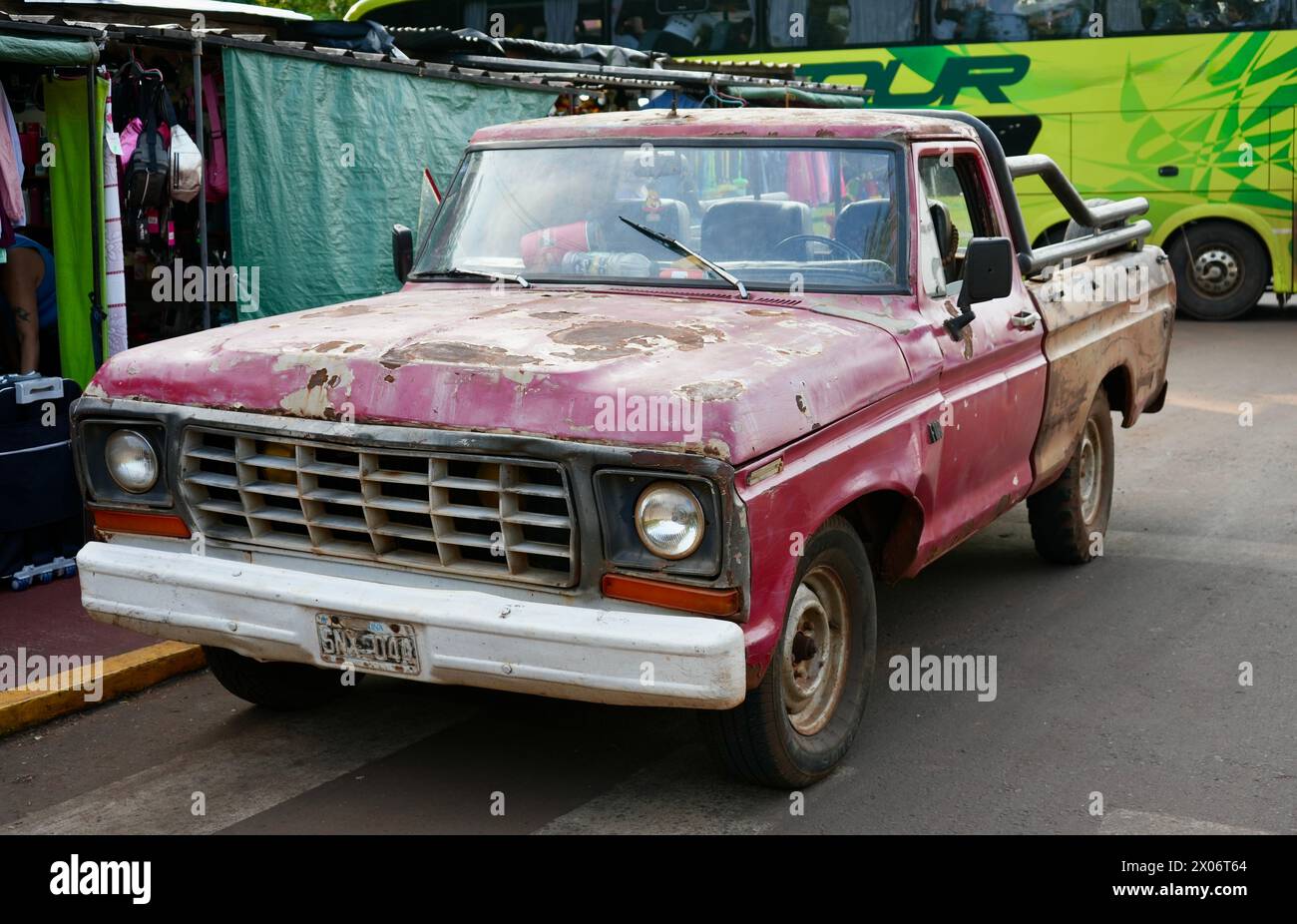 Vintage rusty red Ford F100 pickup truck. Stock Photo