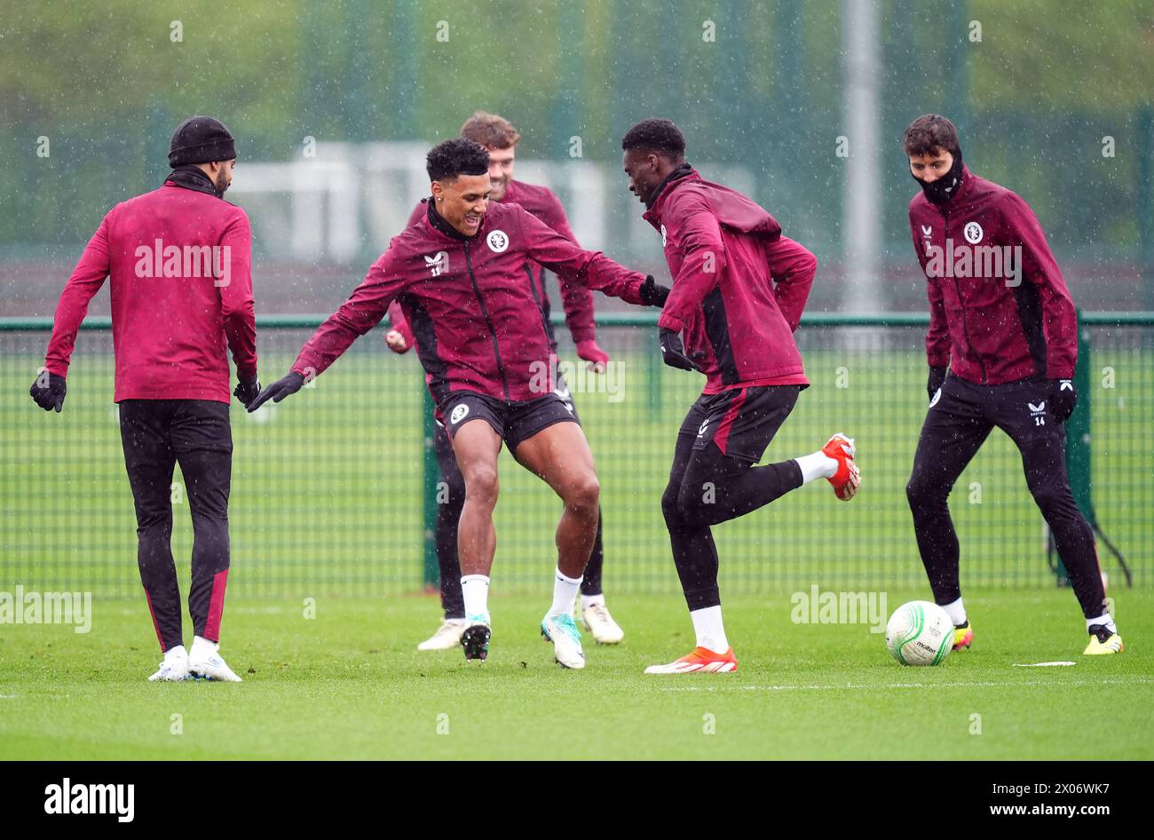 Aston Villa's Ollie Watkins (centre) and Tim Iroegbunam during a training session at the Bodymoor Heath Training Ground, Birmingham. Picture date: Wednesday April 10, 2024. Stock Photo
