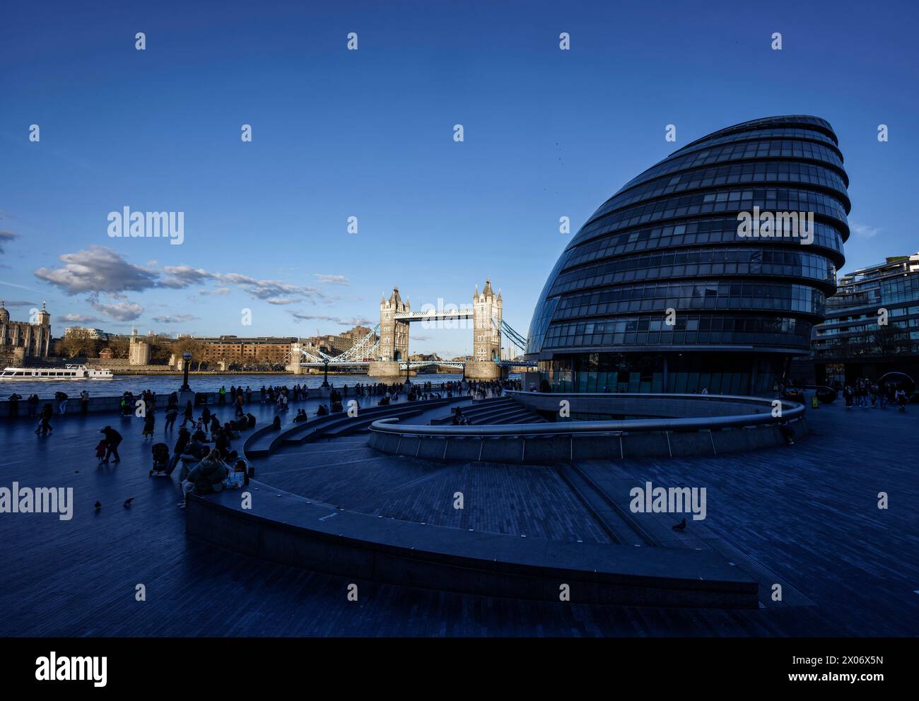 Tower of London, by silhouette of City Hall from More London Development part of London Bridge City, Southwark, London Stock Photo