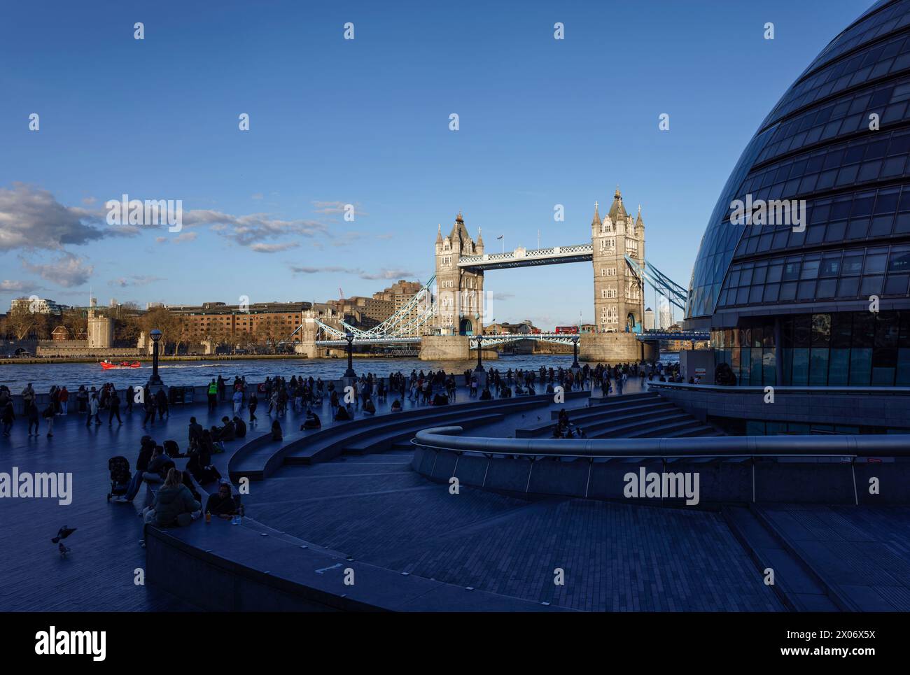 Tower of London, by silhouette of City Hall from More London Development part of London Bridge City, Southwark, London Stock Photo