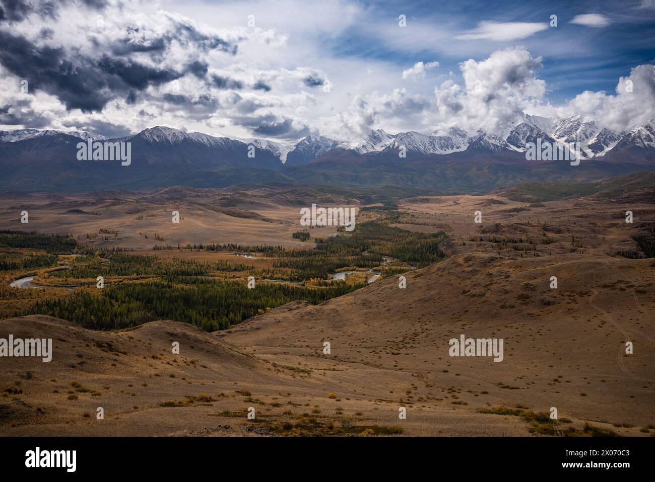A breathtaking landscape view of rolling hills, meandering rivers, and ...