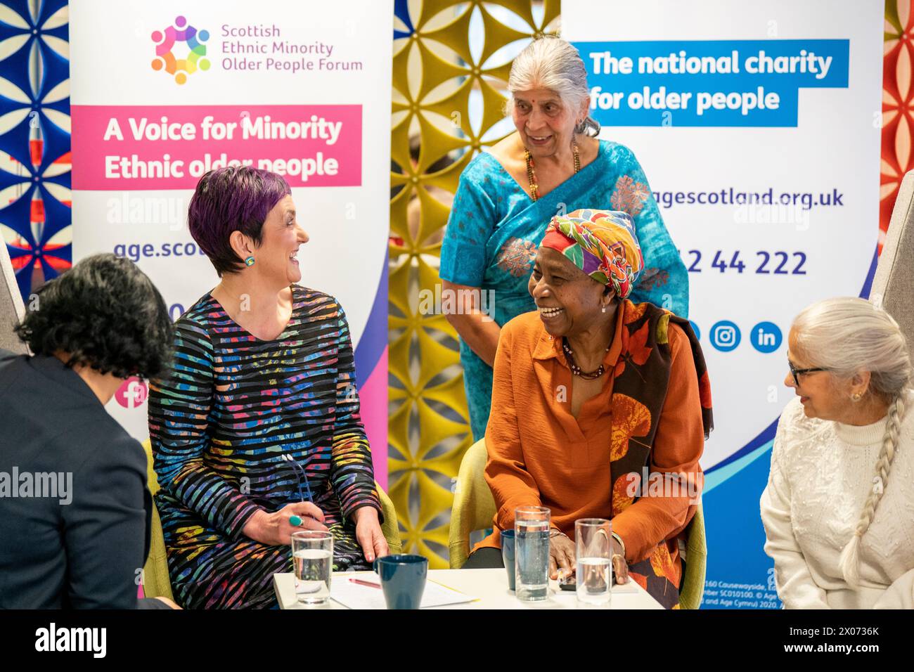 Justice Secretary Angela Constance (left) meets with members of Age Scotland's Scottish Ethnic Minority Older People Forum, to discuss the impact of hate crime on ethnic minority communities and older people, at the Age Scotland offices in Edinburgh. Picture date: Wednesday April 10, 2024. Stock Photo