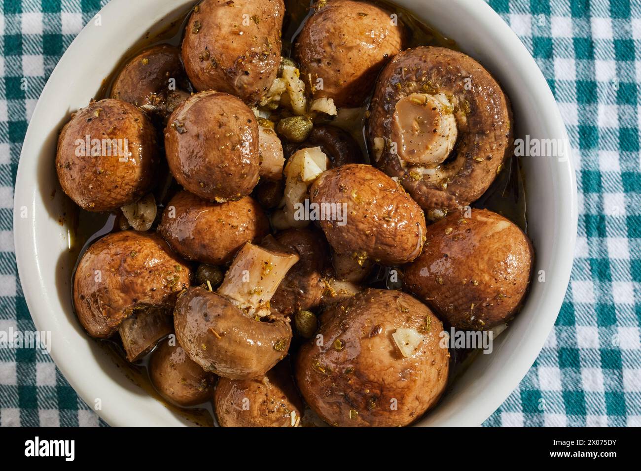 Baby Bella mushrooms marinated in wine vinegar and garlic Stock Photo Alamy