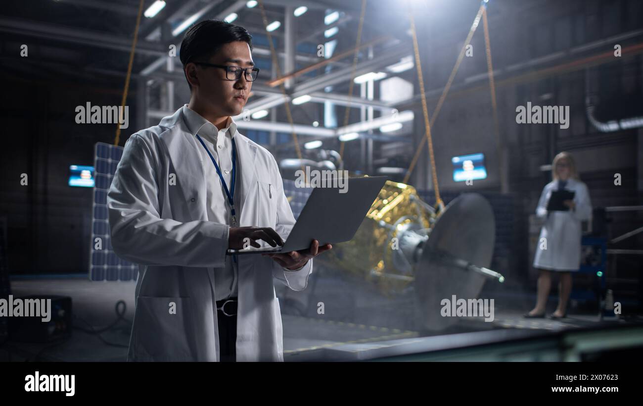 Black male scientist asian female hi-res stock photography and images ...
