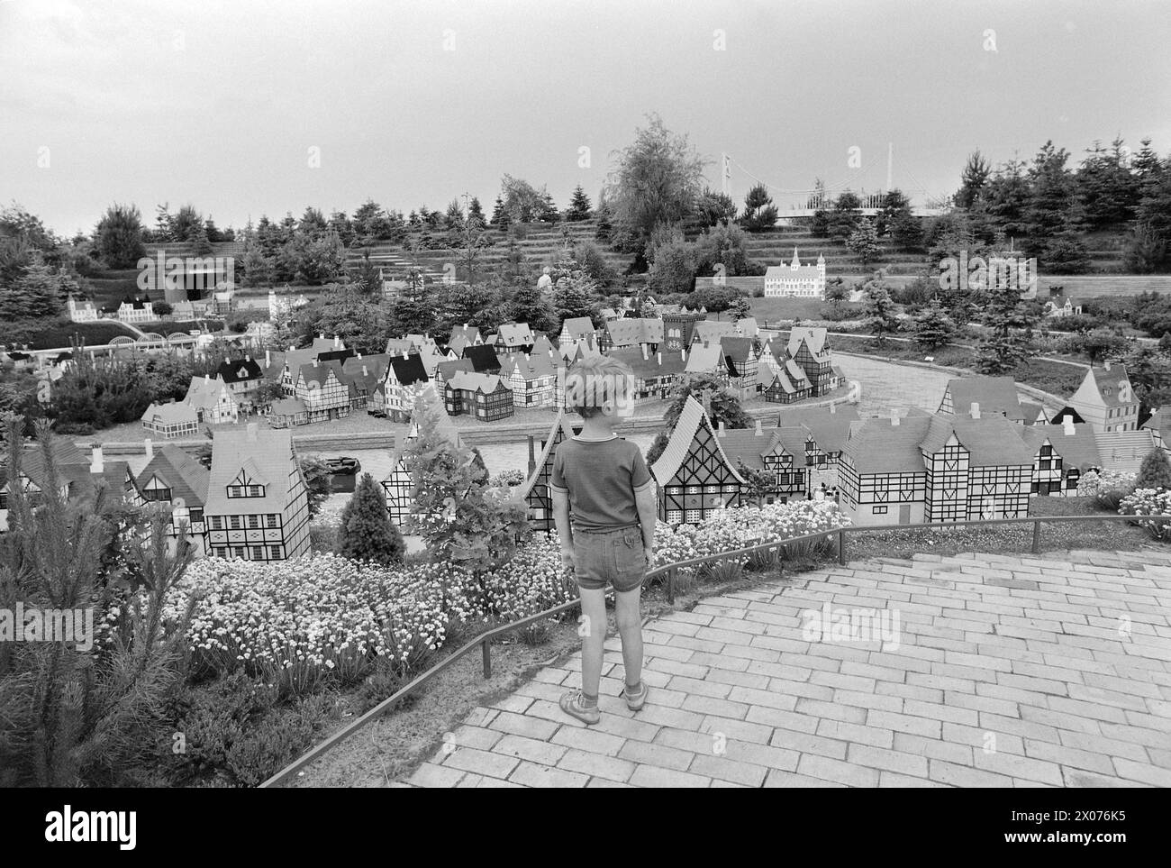Current 30 - 6 - 1973: Playland for young and oldLegoland is a mini-kingdom that lives only on tourism. Last year, this fantasy world near Billund in Denmark was visited by no less than 777,000 enthusiastic people – young and old. The peak visit in one day is 20,000 people. Legoland is an adventure world for children, but it still attracts more adults. Last year, fully 70 per cent of the visitors were adults.  The houses in Legoland have an average height of about one metre. The cities consist of old and new districts and everything is built historically and architecturally correctly according Stock Photo