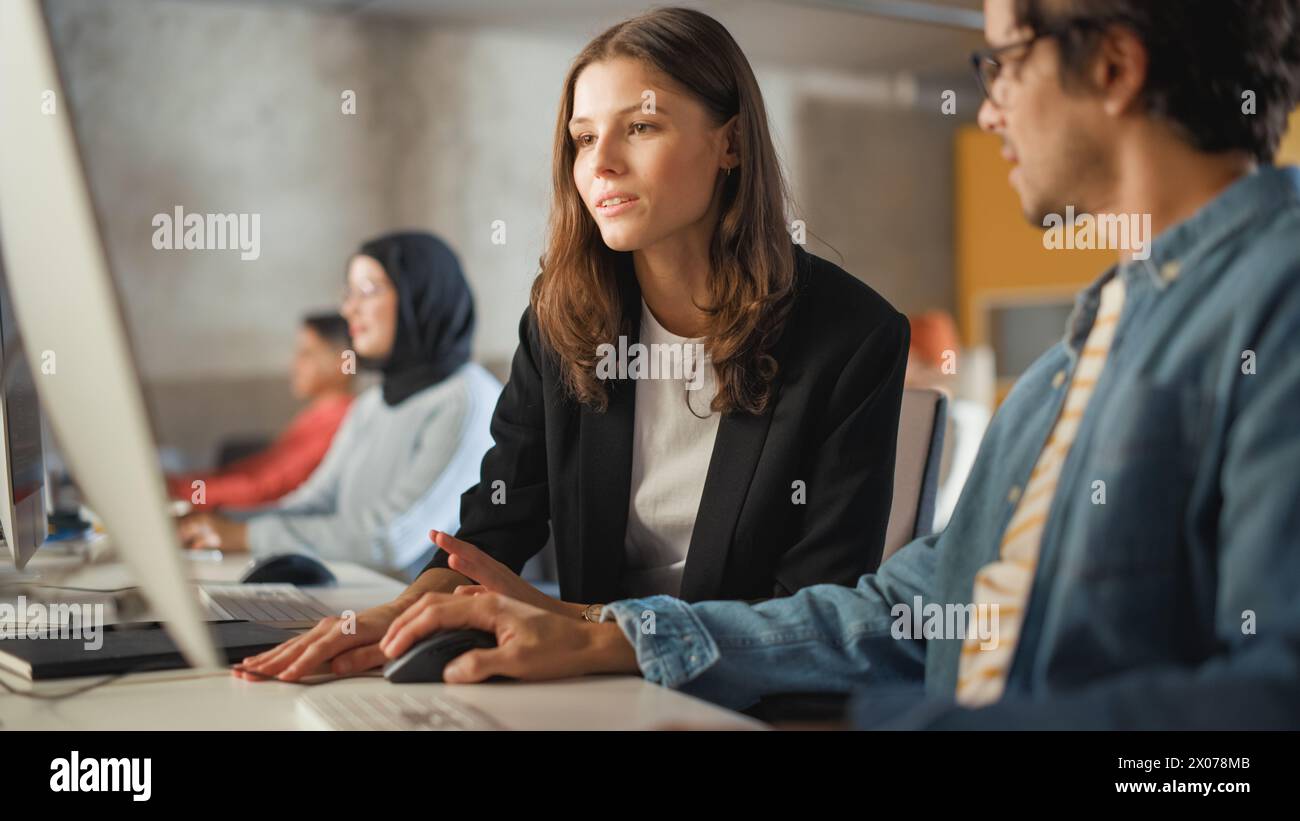 Diverse students studying in computer hi-res stock photography and ...