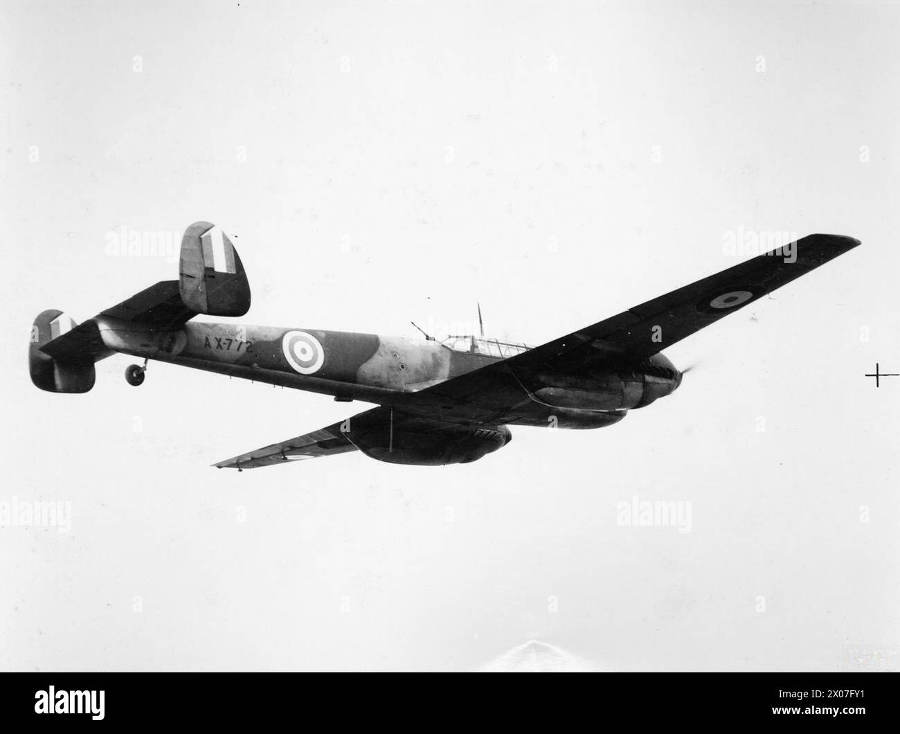 ROYAL AIR FORCE FIGHTER COMMAND, 1939-1945. - Messerschmitt Bf 110C-5, AX772, of No. 1426 (Enemy Aircraft Circus) Flight based at Duxford, Cambridgeshire, in flight. Originally '5F-CM' of 4(F)/14, this aircraft was intercepted by RAF fighters while on a reconnaissance mission on the morning of 21 July 1940. After being forced down near Goodwood racecourse, Sussex, it was taken to the Royal Aircraft Establishment and repaired with parts from another Bf 110C-5 forced down earlier. After handling trials with the RAE, it was flown to the Air Fighting Development Unit at Duxford, Cambridgeshire, as Stock Photo