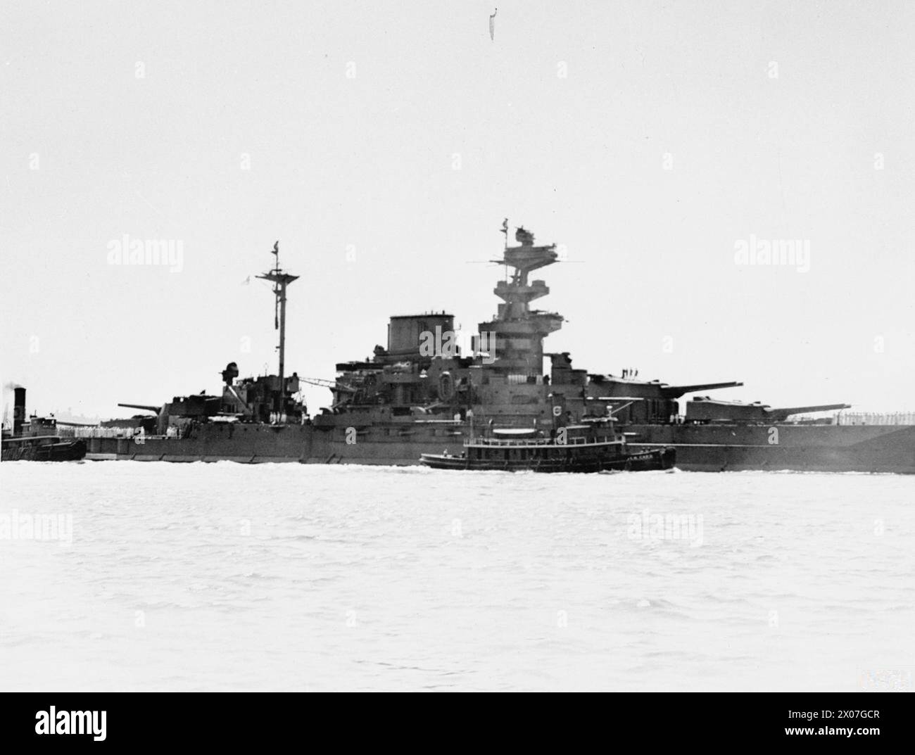 HMS MALAYA LEAVING NEW YORK HARBOUR AFTER REFITTING IN AMERICA UNDER FACILITIES AFFORDED BY THE US GOVERNMENT. - , Royal Navy, MALAYA (HMS) Stock Photo