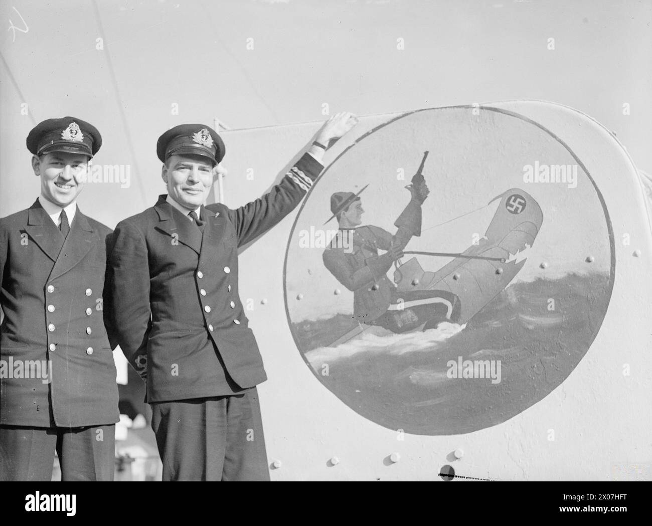 CANADIAN CORVETTES EMBLEM. 16 NOVEMBER 1942. - Two officers of the ...