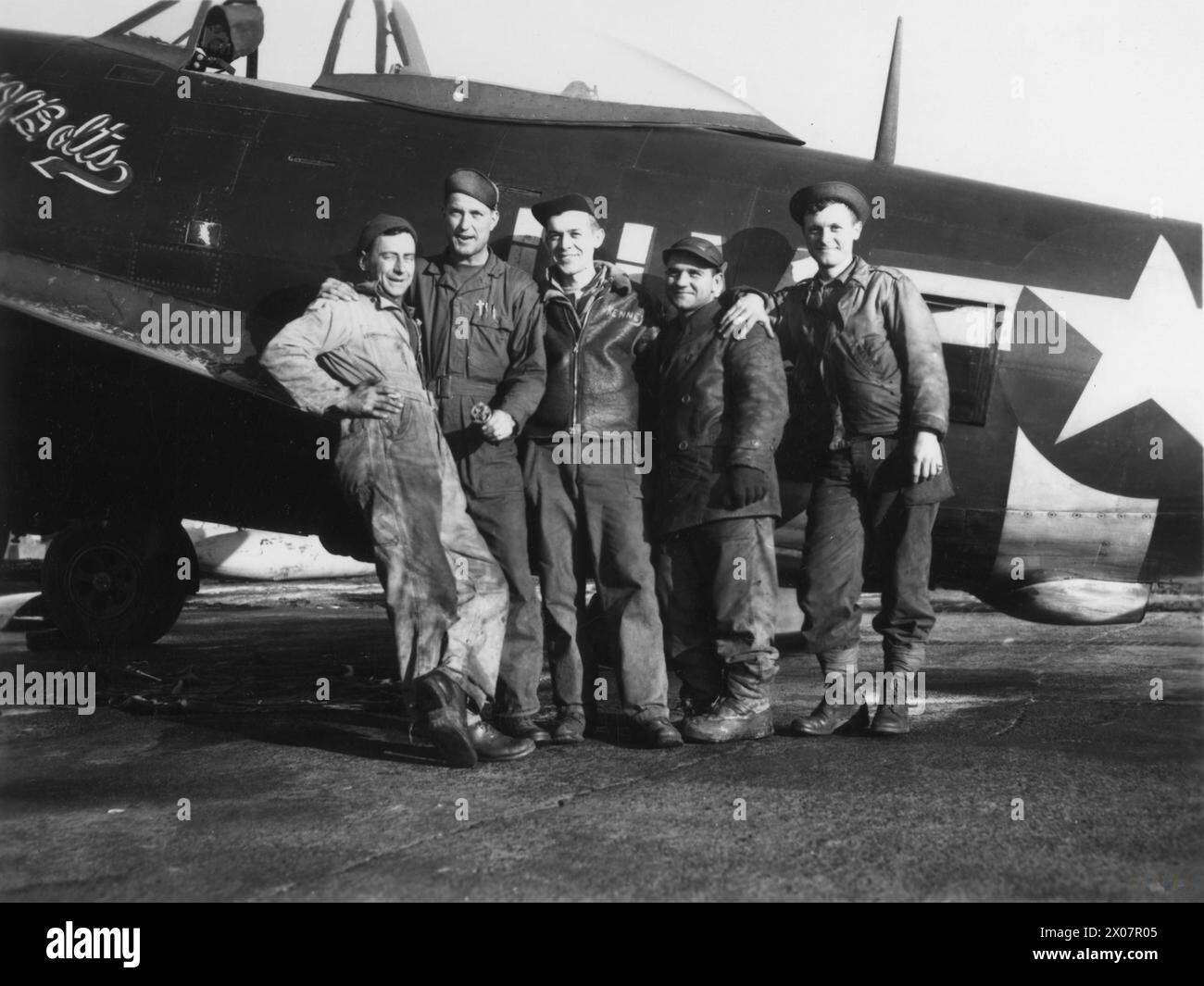 Ground crew of the 61st Fighter Squadron, 56th Fighter Group, stand ...