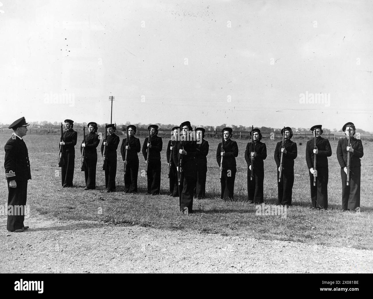 Wrnsn WRNS guard of DEMS ratings parades in Grimsby in June 1943 during the ...