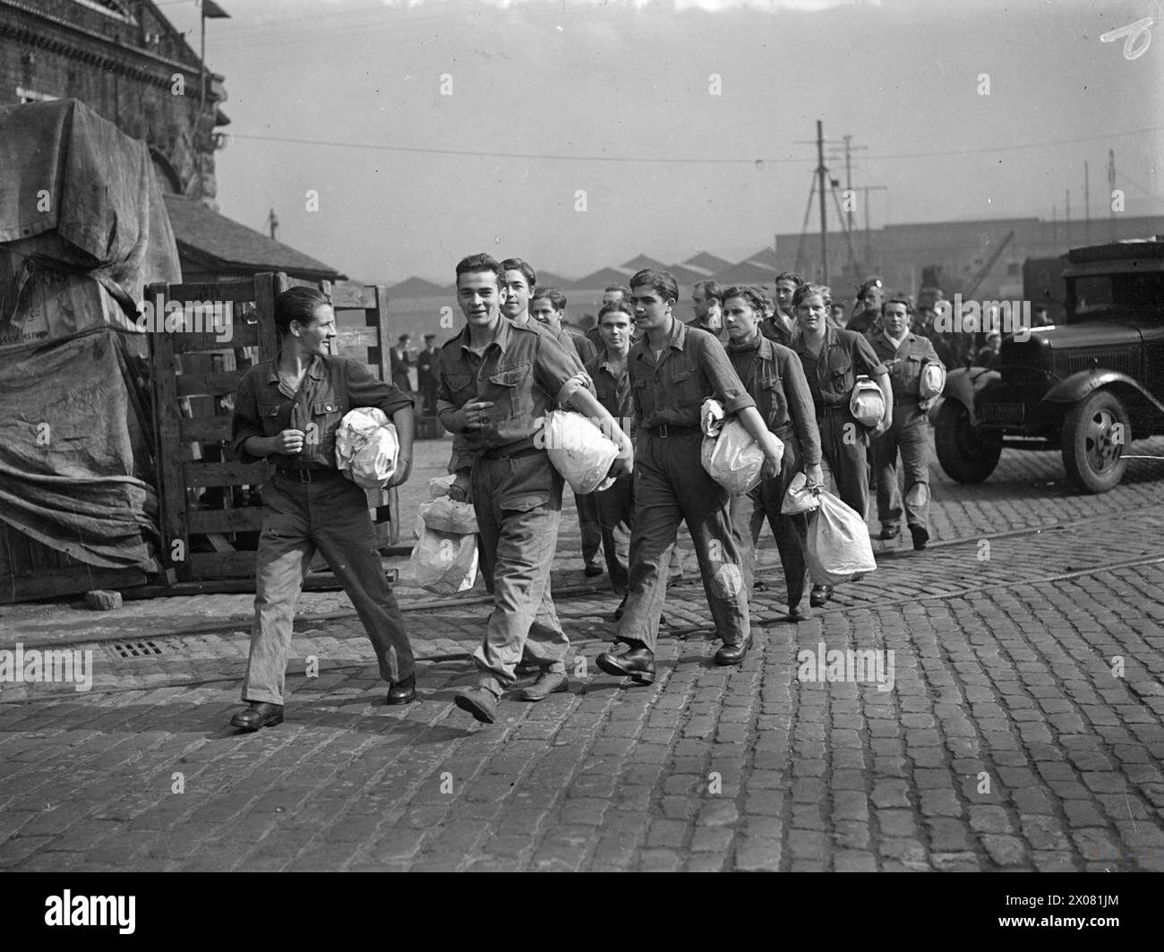 U BOAT PRISONERS ARRIVE AT A UNITED KINGDOM PORT ABOARD HMS REVENGE. 9