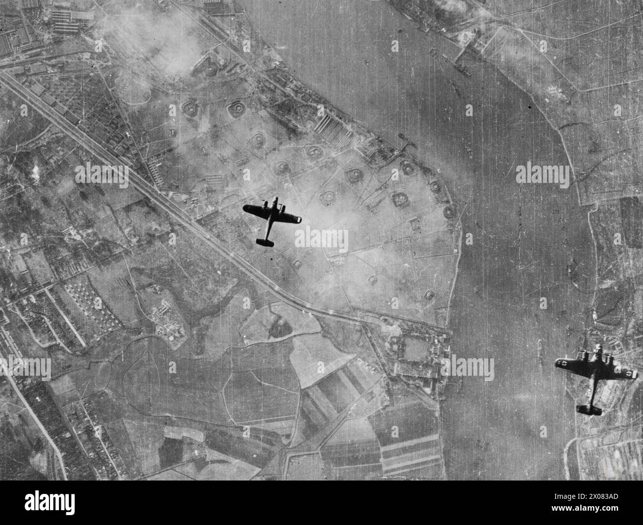 WW2 Propaganda photo of a German Dornier Do 215 bomber banking WW2 Propaganda photo of a German Dornier Do 215 bomber banking