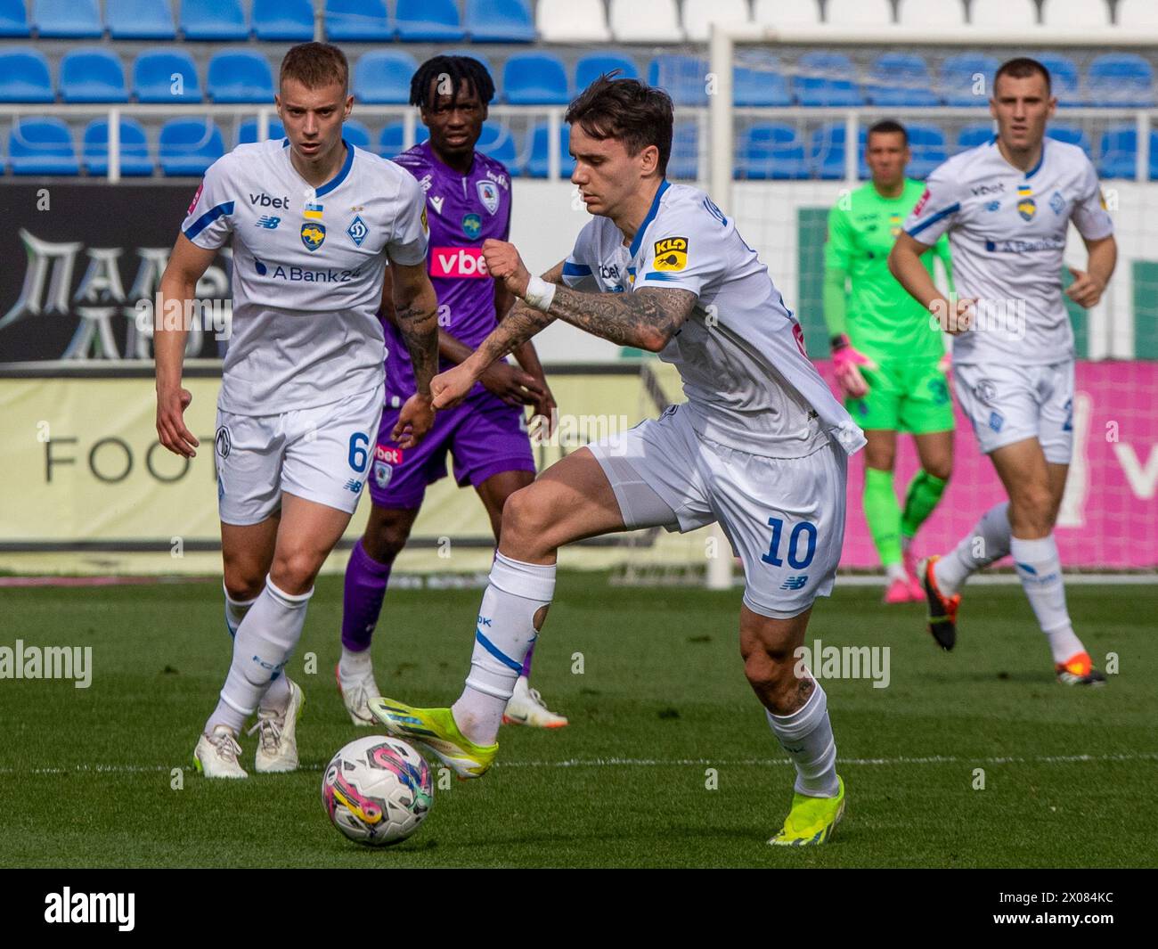 KYIV, UKRAINE - APRIL 8, 2024 - Midfielders Volodymyr Brazhko (L) and Mykola Shaparenko of FC Dynamo Kyiv are seen during the Ukrainian Premier League Matchday 23 fixture against FC LNZ Cherkasy at the Valeriy Lobanovskyi Dynamo Stadium, Kyiv, capital of Ukraine. Stock Photo