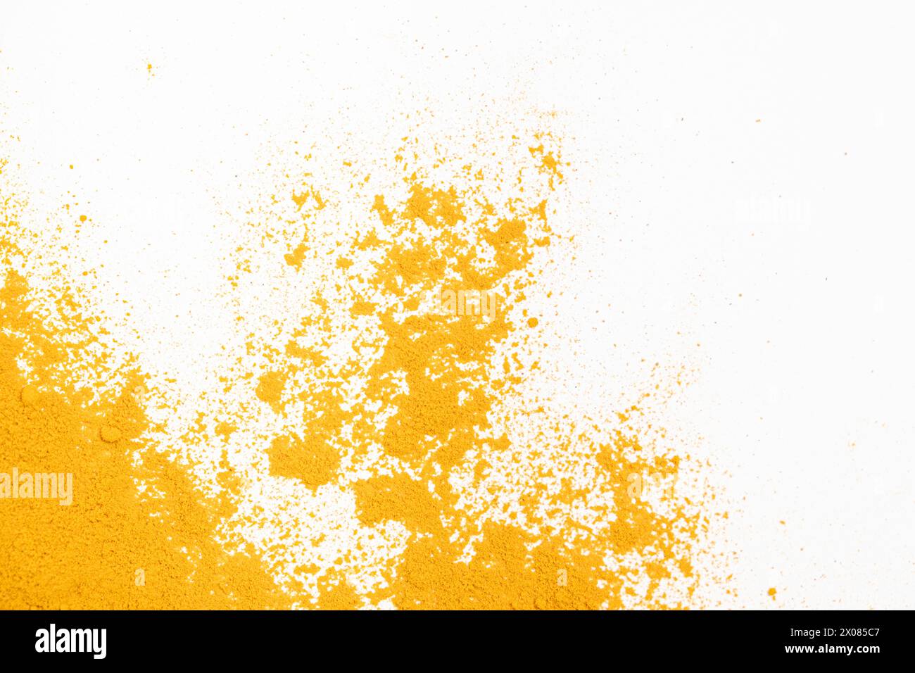 Scattered turmeric powder on white background, turmeric pattern and ...