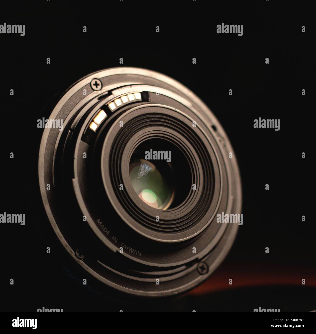 DSLR Lens: Capturing Light in Darkness Stock Photo