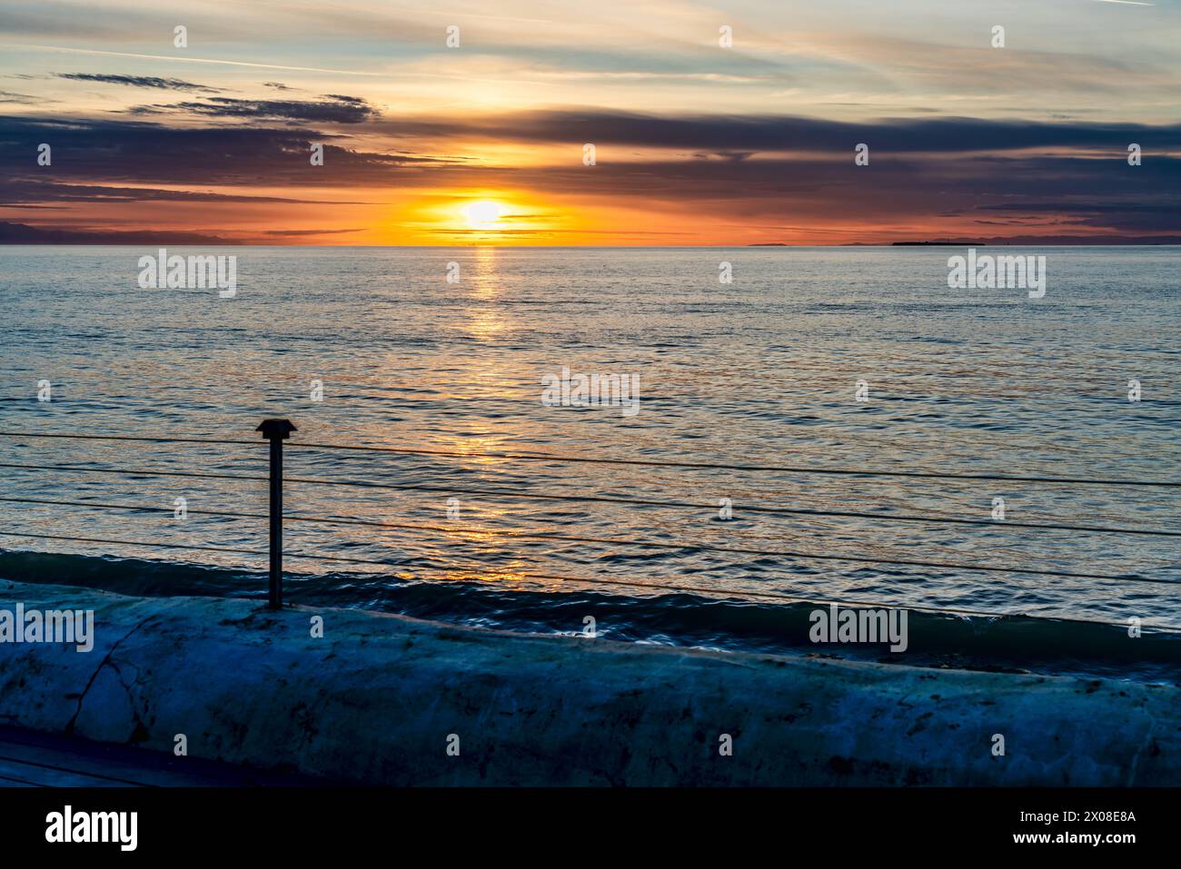 A view of a goden sunset in Oak Harbor, Washington. Stock Photo