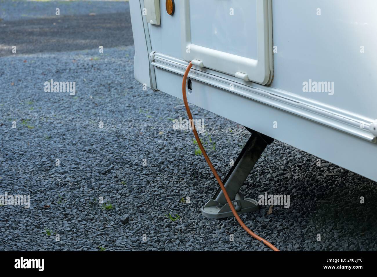 Caravan electric hook up at pitch site Stock Photo Alamy