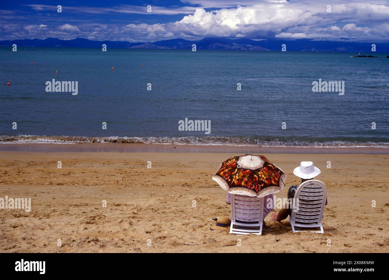 Couple on the beach Stock Photo