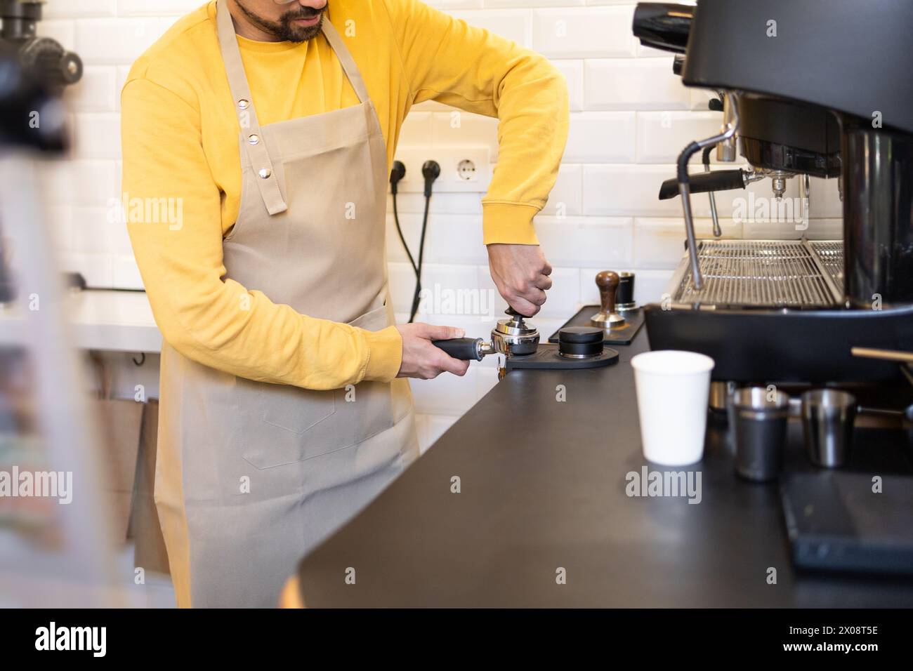 Beige apron hi-res stock photography and images - Alamy