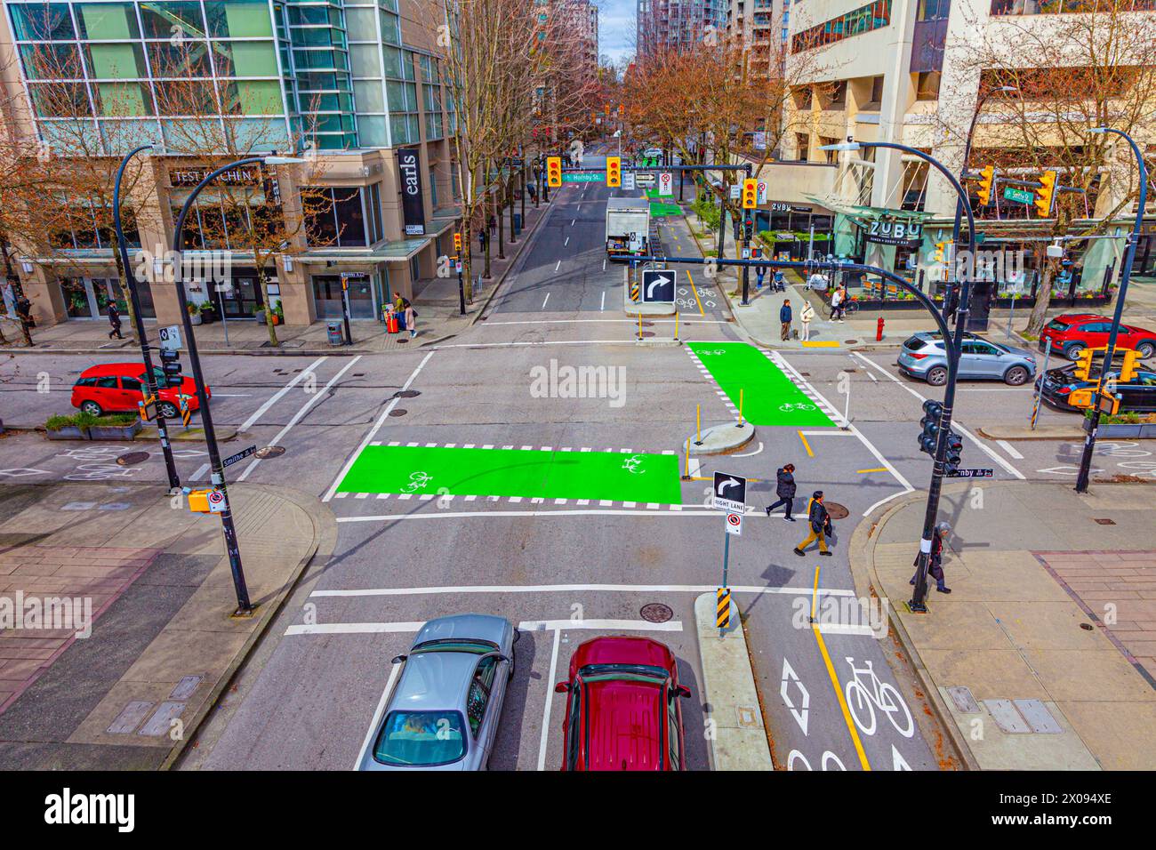 Bicycle friendly intersection in downtown Vancouver Canada Stock Photo