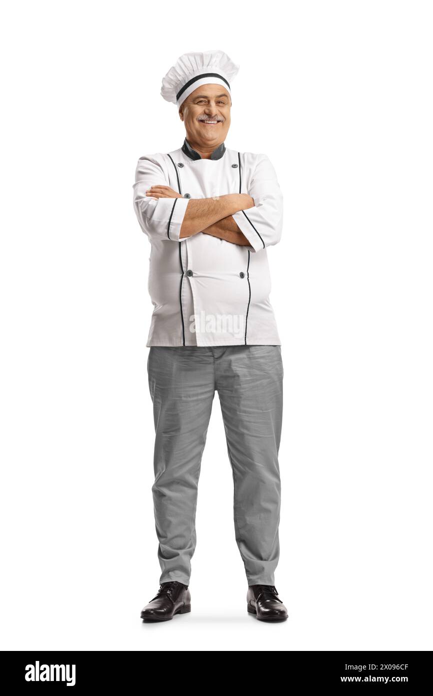 Cheerful mature male chef posing with folded arms isolated on white background Stock Photo