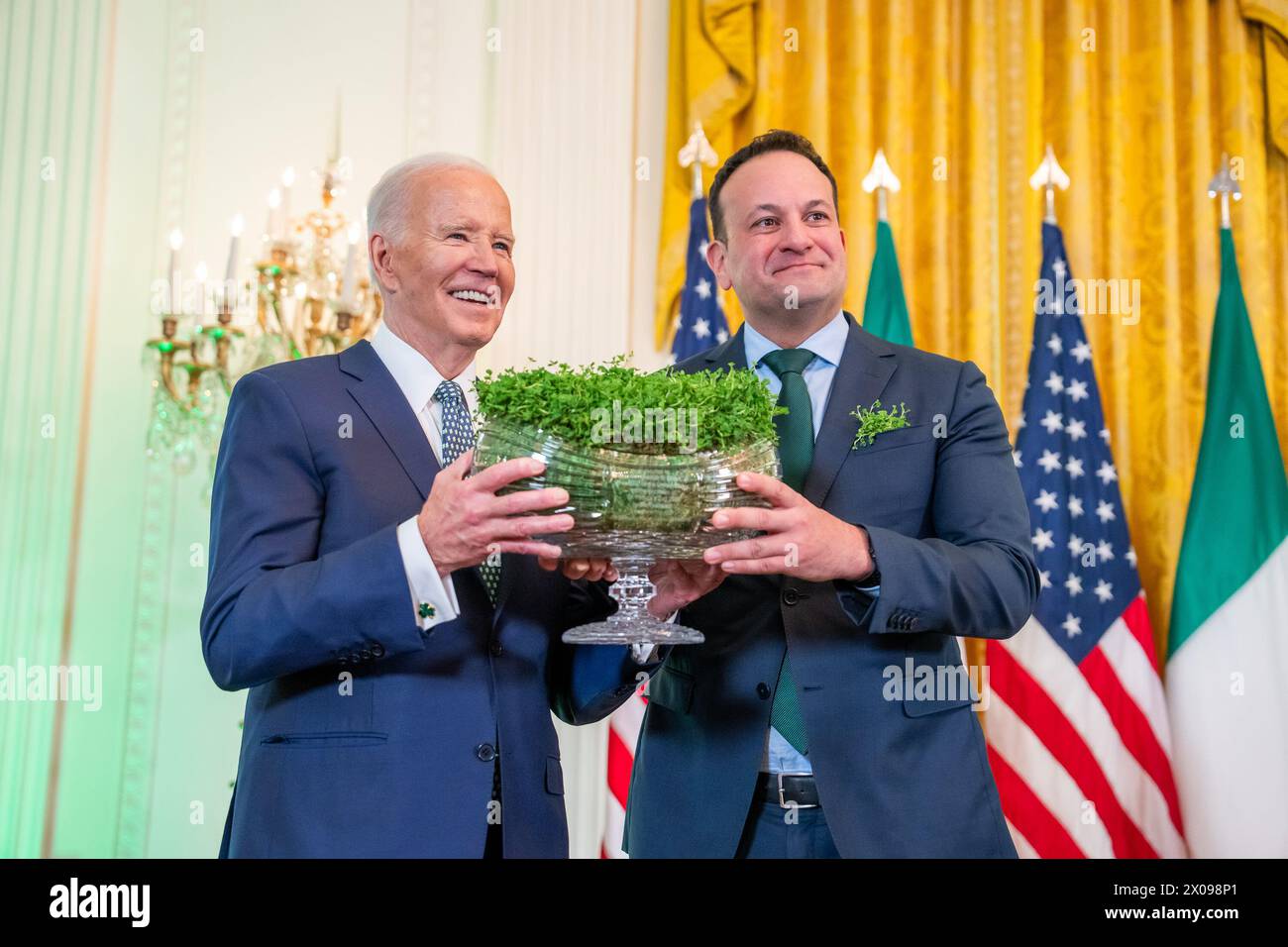March 17, 2024 - Washington, District of Columbia, U.S. - Taoiseach of Ireland Leo Varadkar presents a shamrock bowl to President Joe Biden at a St. Patrick's Day reception, Sunday, March 17, 2024, in the East Room of the White House. (Credit Image: © White House/ZUMA Press Wire) EDITORIAL USAGE ONLY! Not for Commercial USAGE! Stock Photo