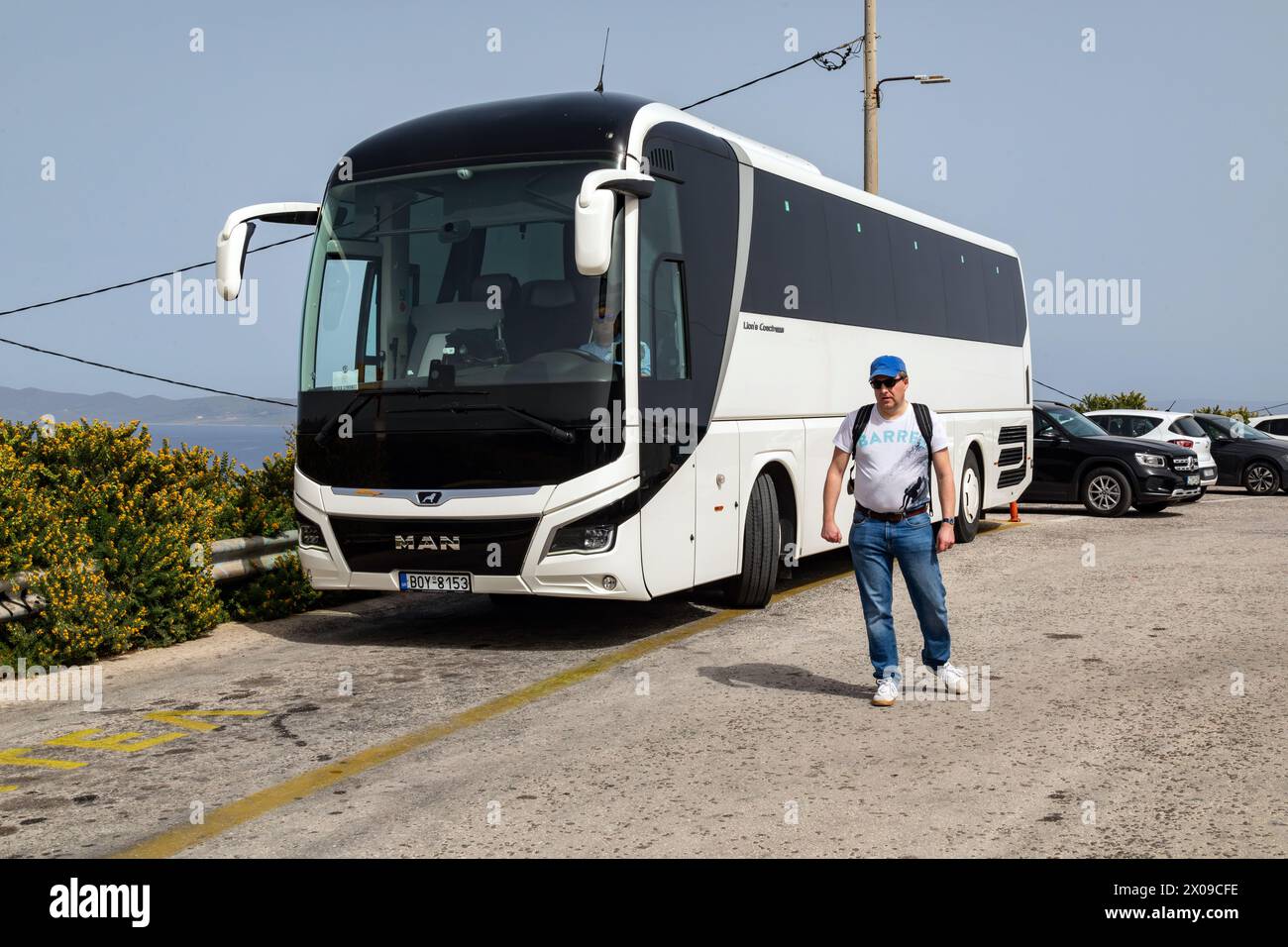 White tour coach at Cape Sounion, Greece, Europe Stock Photo - Alamy