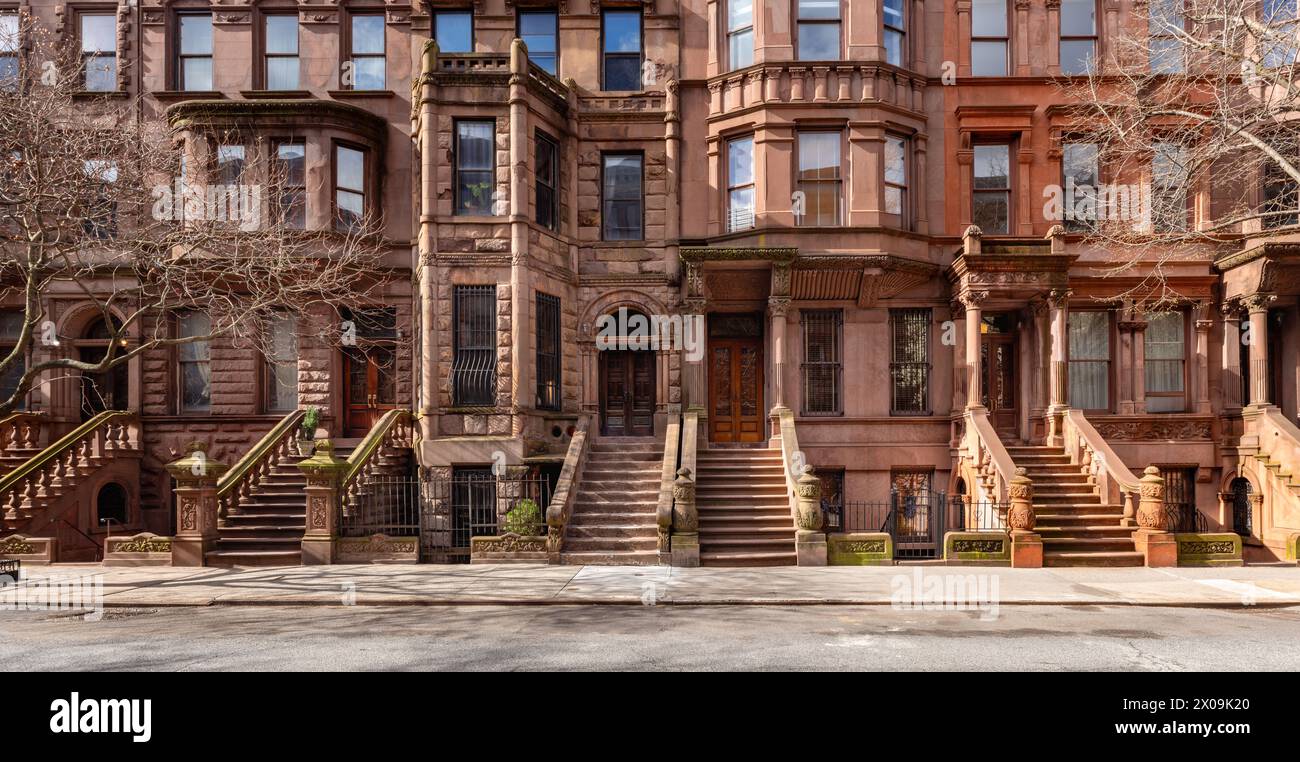 Panoramic view of Brownstones in Harlem. Rows of Townhouses. (Mount Morris Park Historic District). Manhattan, New York City Stock Photo