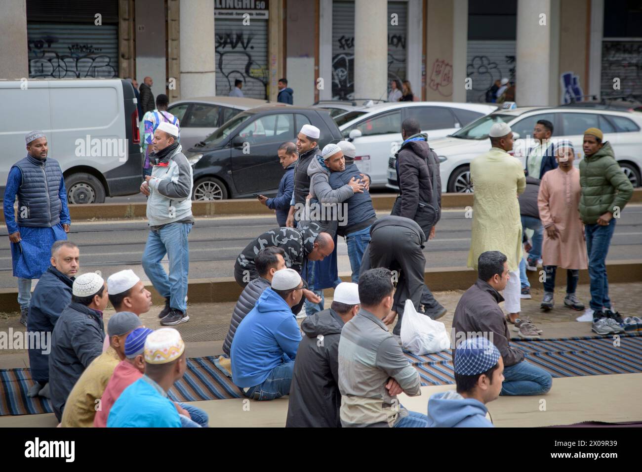 Muslim Rome Rome, Italy. 10th Apr, 2024. Two Muslim men embrace on Eid al-Fitr to ...