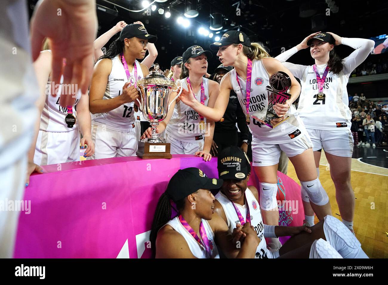 London Lions team with the trophy after victory in the EuroCup Women's Final second leg match at the Copperbox Arena, London. Picture date: Wednesday April 10, 2024. See PA story BASKETBALL London. Photo credit should read: Zac Goodwin/PA Wire. RESTRICTIONS: Use subject to restrictions. Editorial use only, no commercial use without prior consent from rights holder. Stock Photo