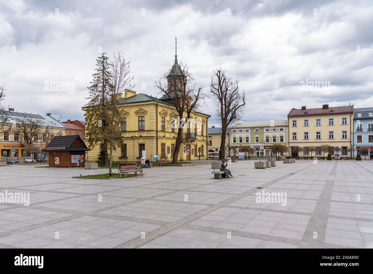 Nowy Targ, Poland - April 6, 2024: View of the town hall building on the Market Square on a cloudy day Stock Photo