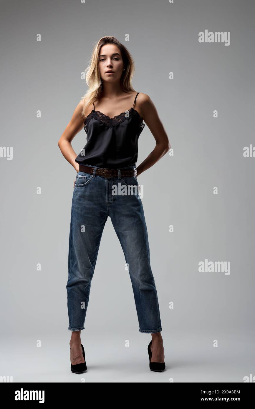 candid girl in faded jeans hi-res 